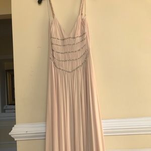 Pink floor length BCBG Max Azria dress.